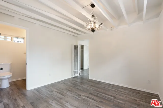 a kitchen with stainless steel appliances a sink dishwasher a stove top oven a sink and dishwasher