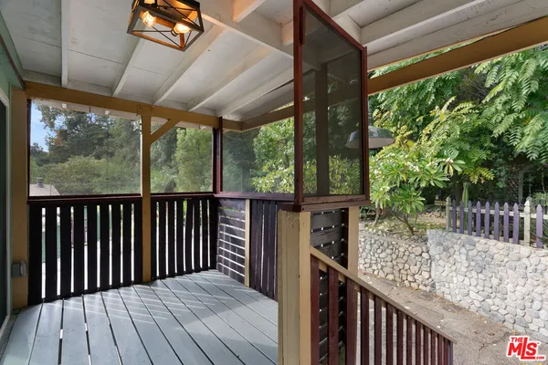 a kitchen with stainless steel appliances a refrigerator stove microwave and cabinets