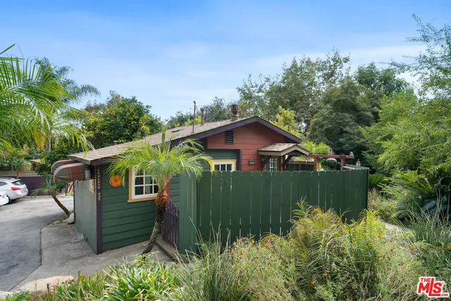 a kitchen with stainless steel appliances granite countertop a sink stove and microwave