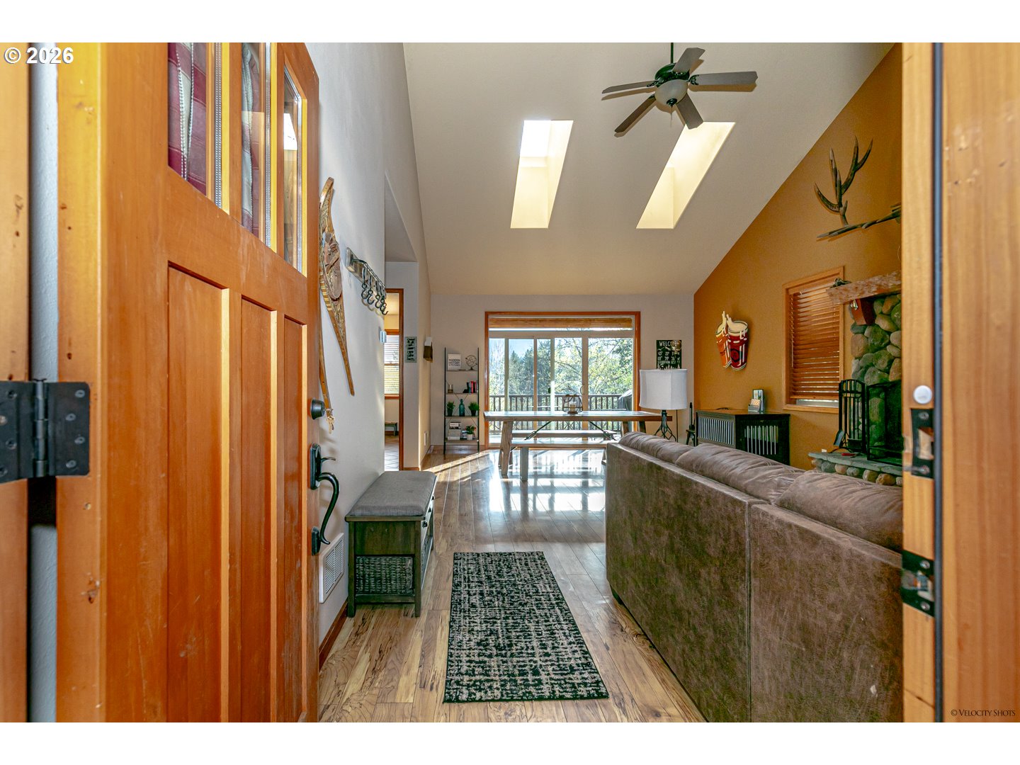 64636 Mc Intyre Road Rhododendron, OR 97049 - Photo 6 of 48 a hallway with a large window and furniture