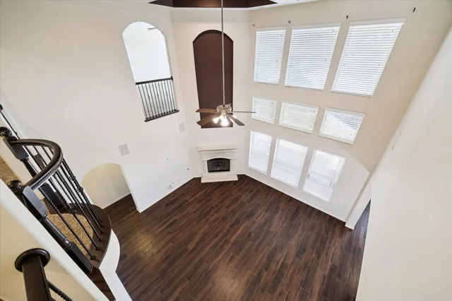 a view of an entryway with wooden floor