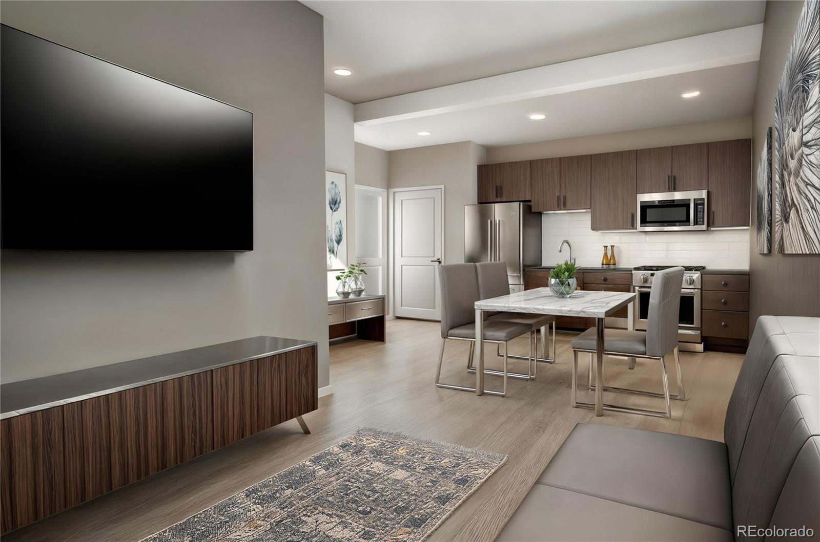 1643 Boulder Street, Unit 307 Denver, CO 80211 - Photo 2 of 8 a living room with stainless steel appliances furniture a rug and a view of kitchen