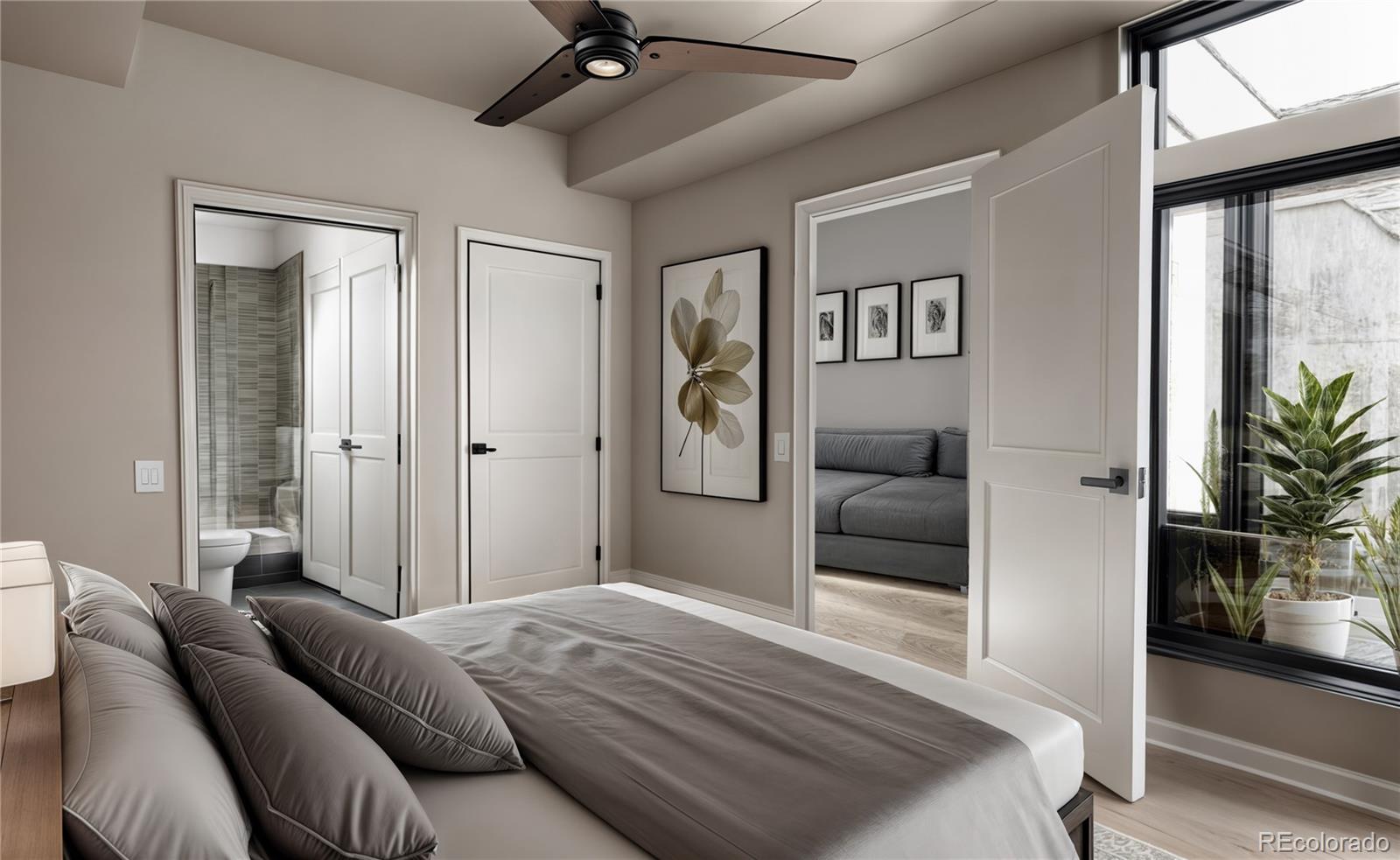 1643 Boulder Street, Unit 307 Denver, CO 80211 - Photo 3 of 8 a bedroom with a large bed and a couch