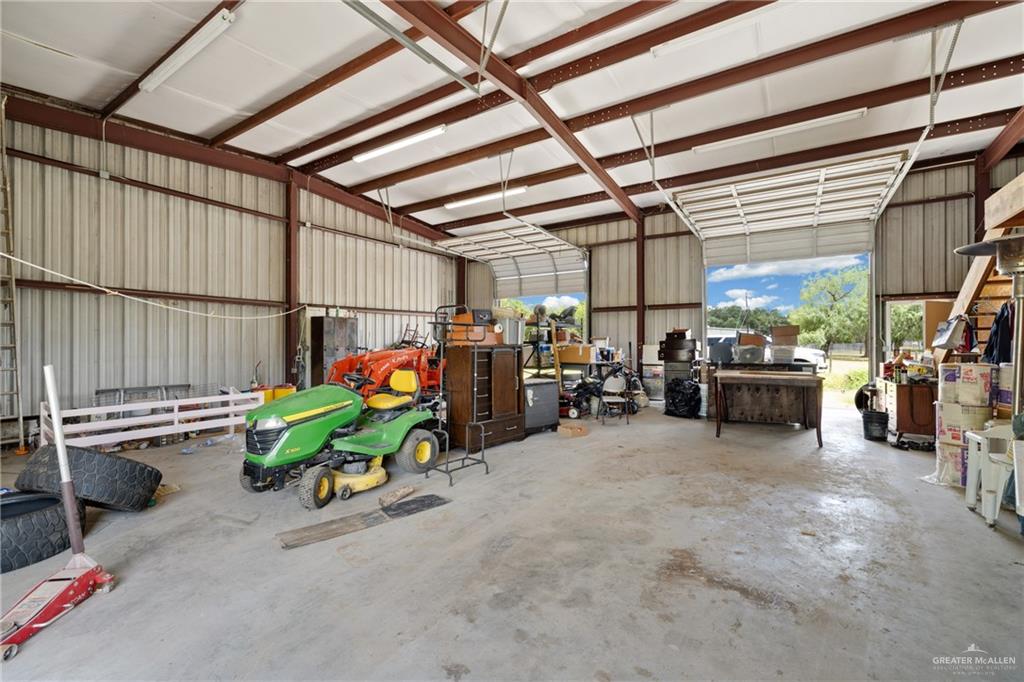 10612 North Ware Road McAllen, TX 78504 - Photo 12 of 20 a view of a garage with parked cars