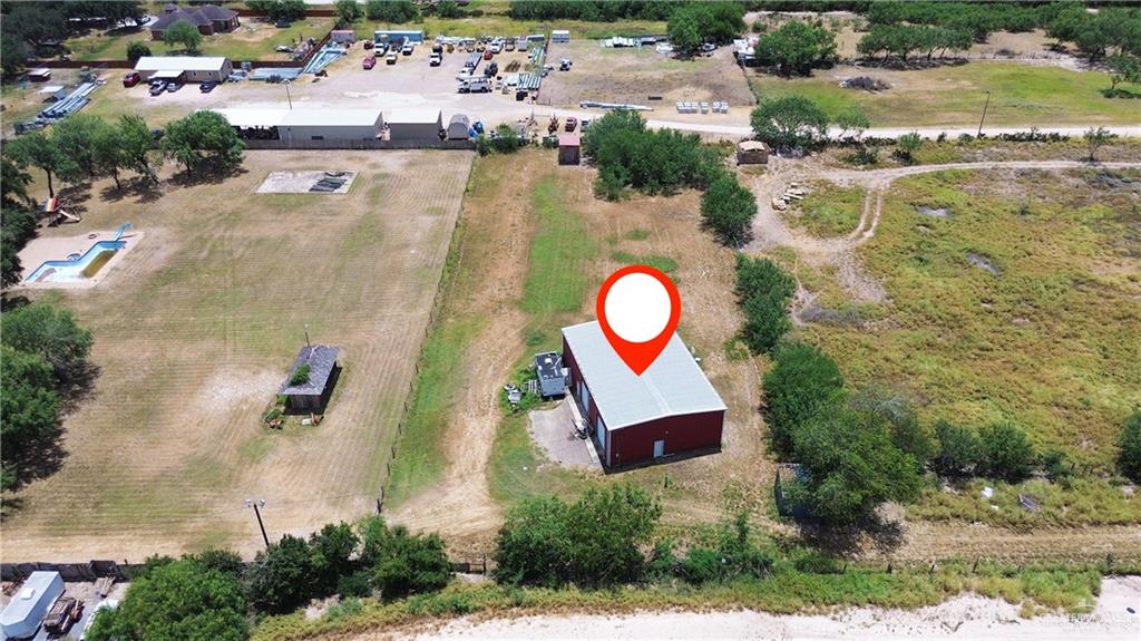 10612 North Ware Road McAllen, TX 78504 - Photo 4 of 20 an aerial view of a house with a swimming pool and outdoor space
