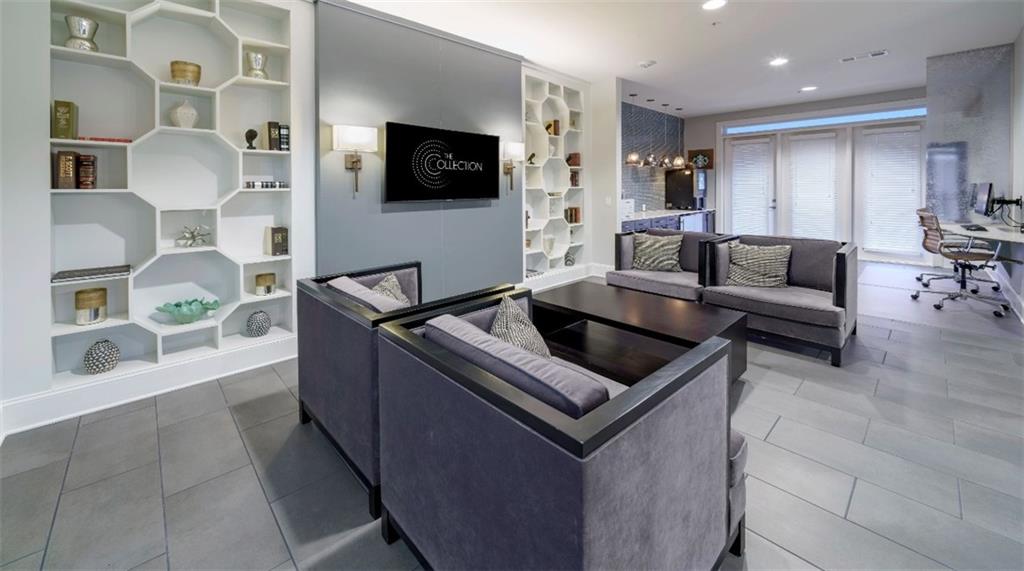 4600 Roswell Road, Unit 666 Sandy Springs, GA 30342 - Photo 16 of 22 a kitchen with stainless steel appliances granite countertop a sink and a microwave