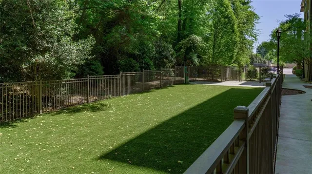 a view of a backyard with a lake view
