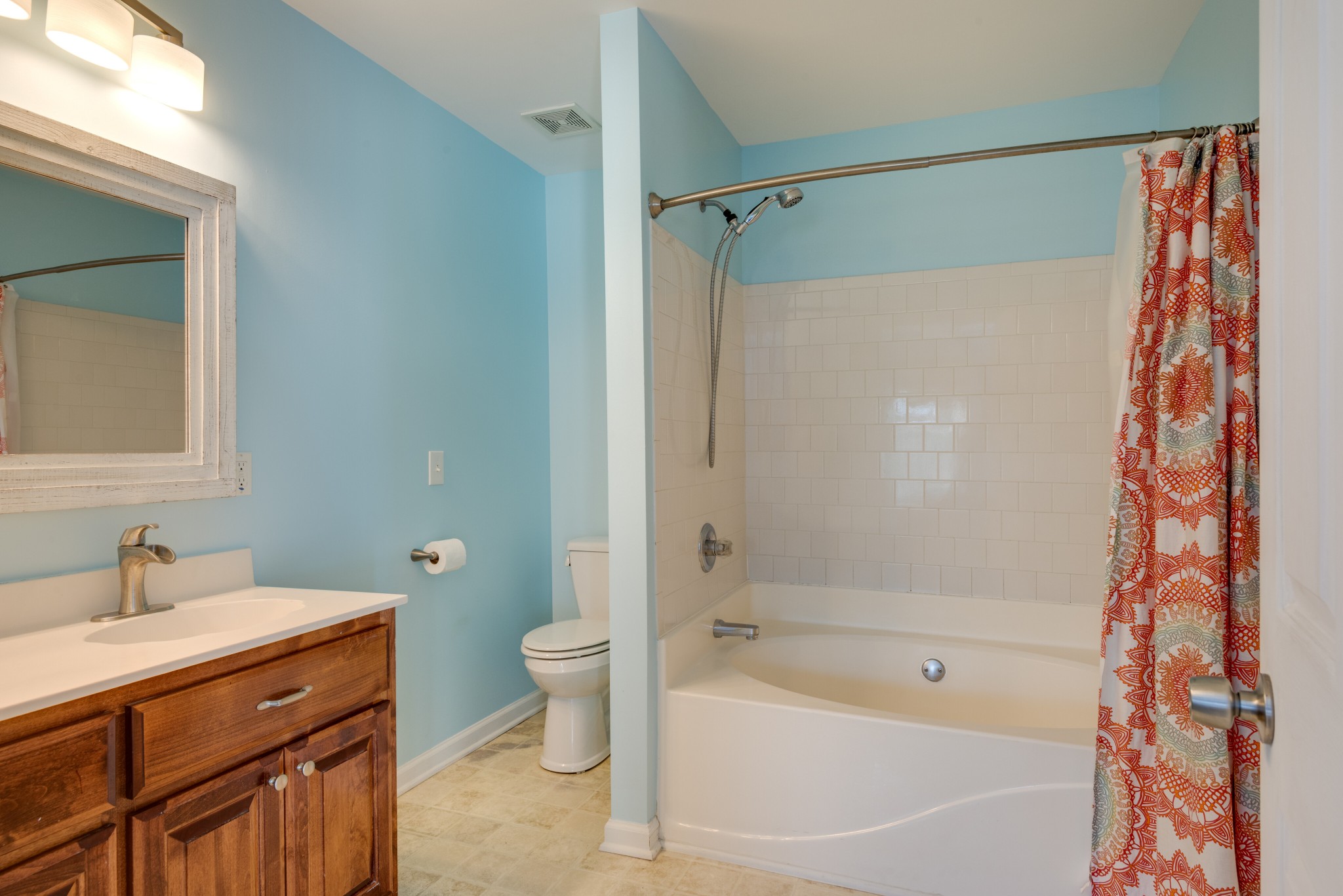303 Cheairs Court Spring Hill, TN 37174 - Photo 12 of 23 a bathroom with a sink a toilet and shower