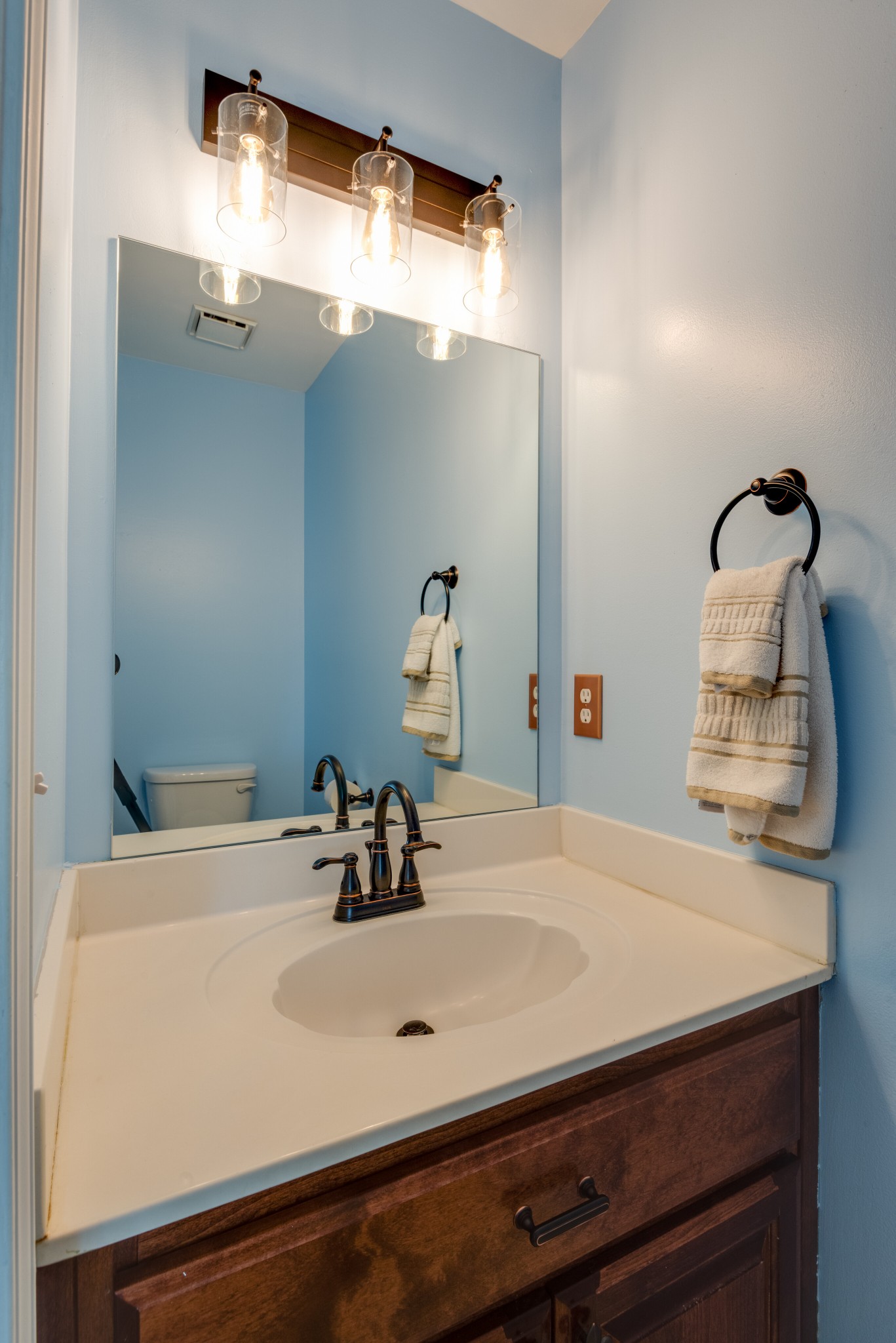 303 Cheairs Court Spring Hill, TN 37174 - Photo 19 of 23 a bathroom with a sink and a mirror