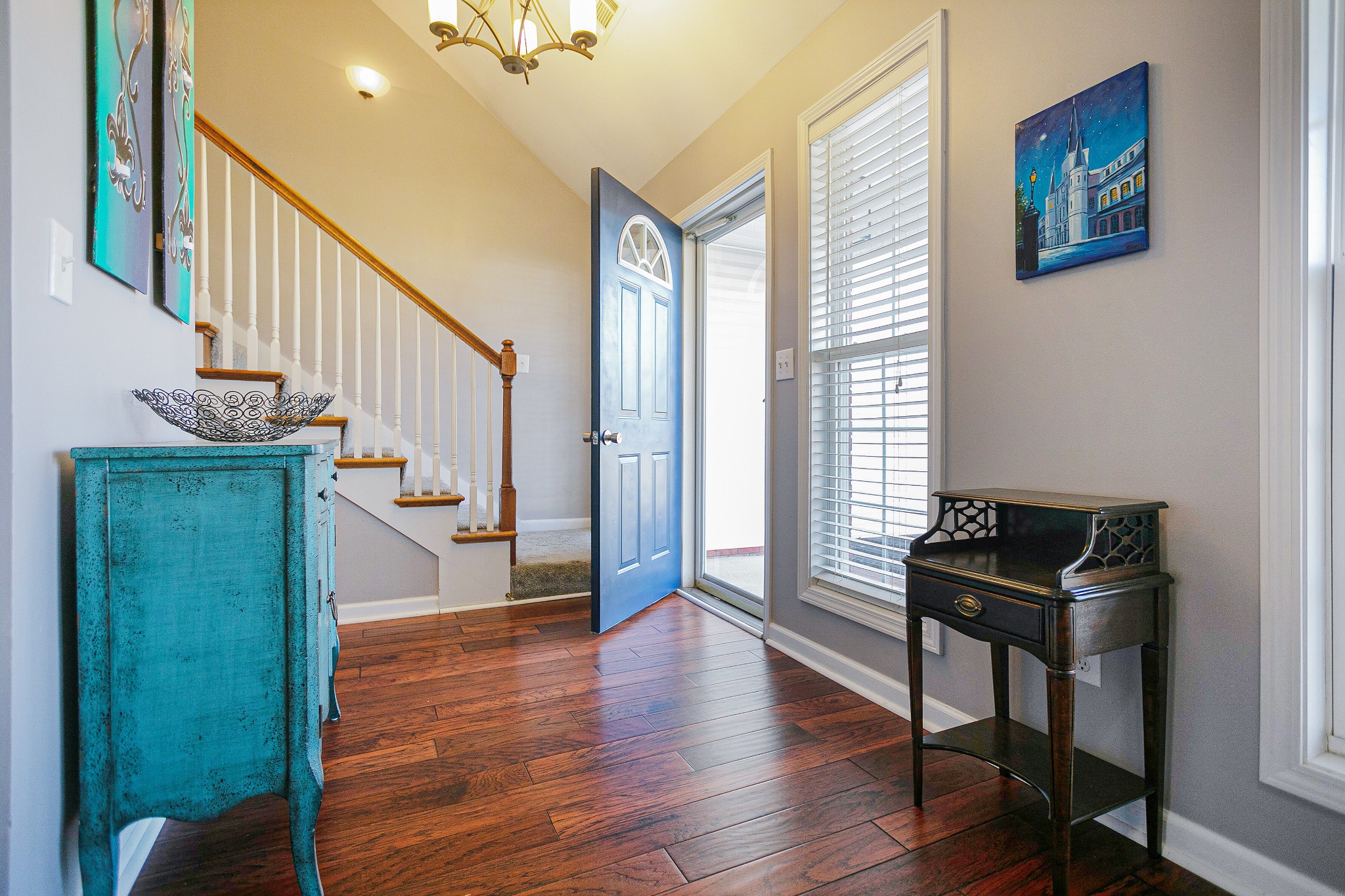 303 Cheairs Court Spring Hill, TN 37174 - Photo 3 of 23 a view of a livingroom with furniture and hardwood floor