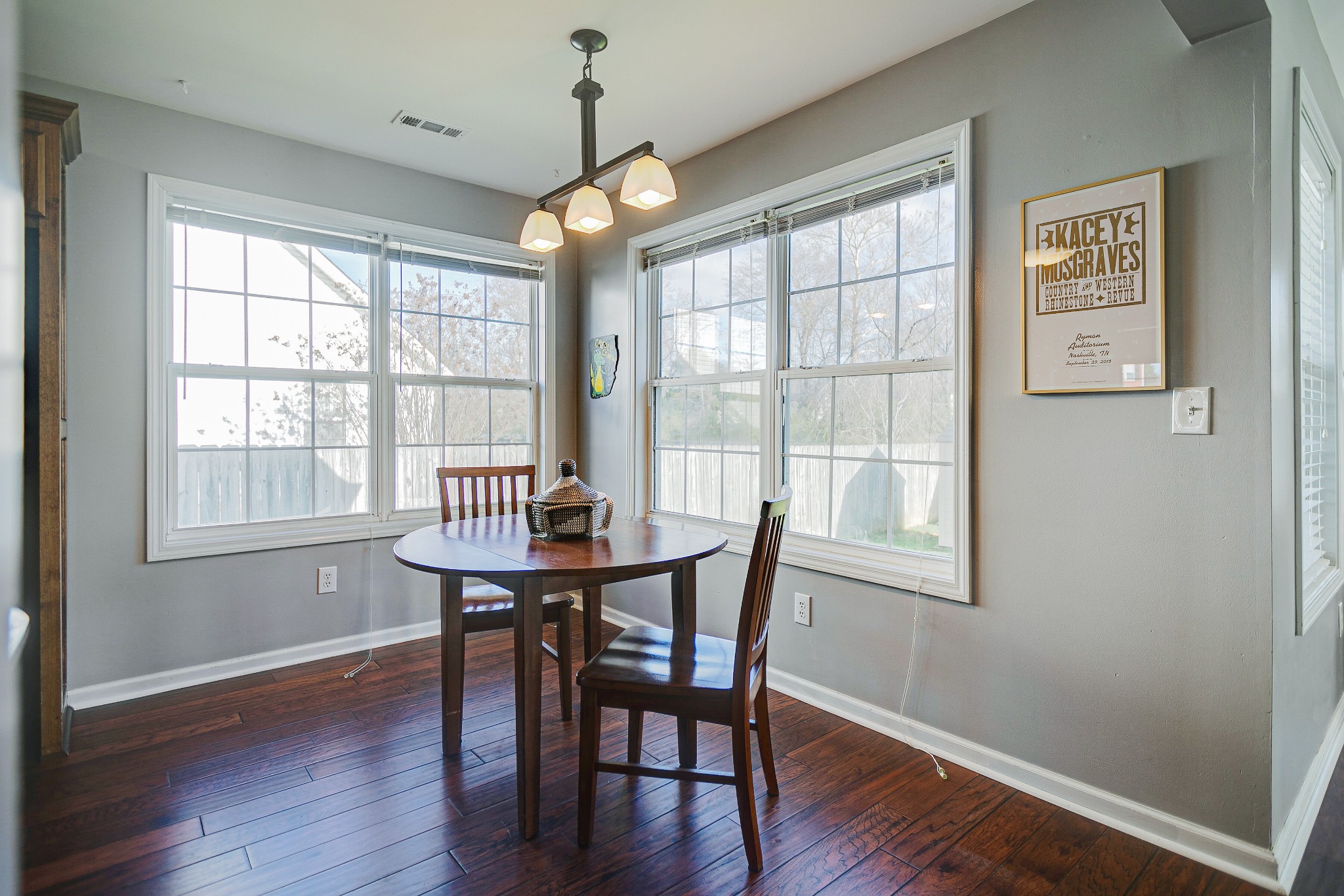 303 Cheairs Court Spring Hill, TN 37174 - Photo 7 of 23 a view of a dining room with furniture window and wooden floor
