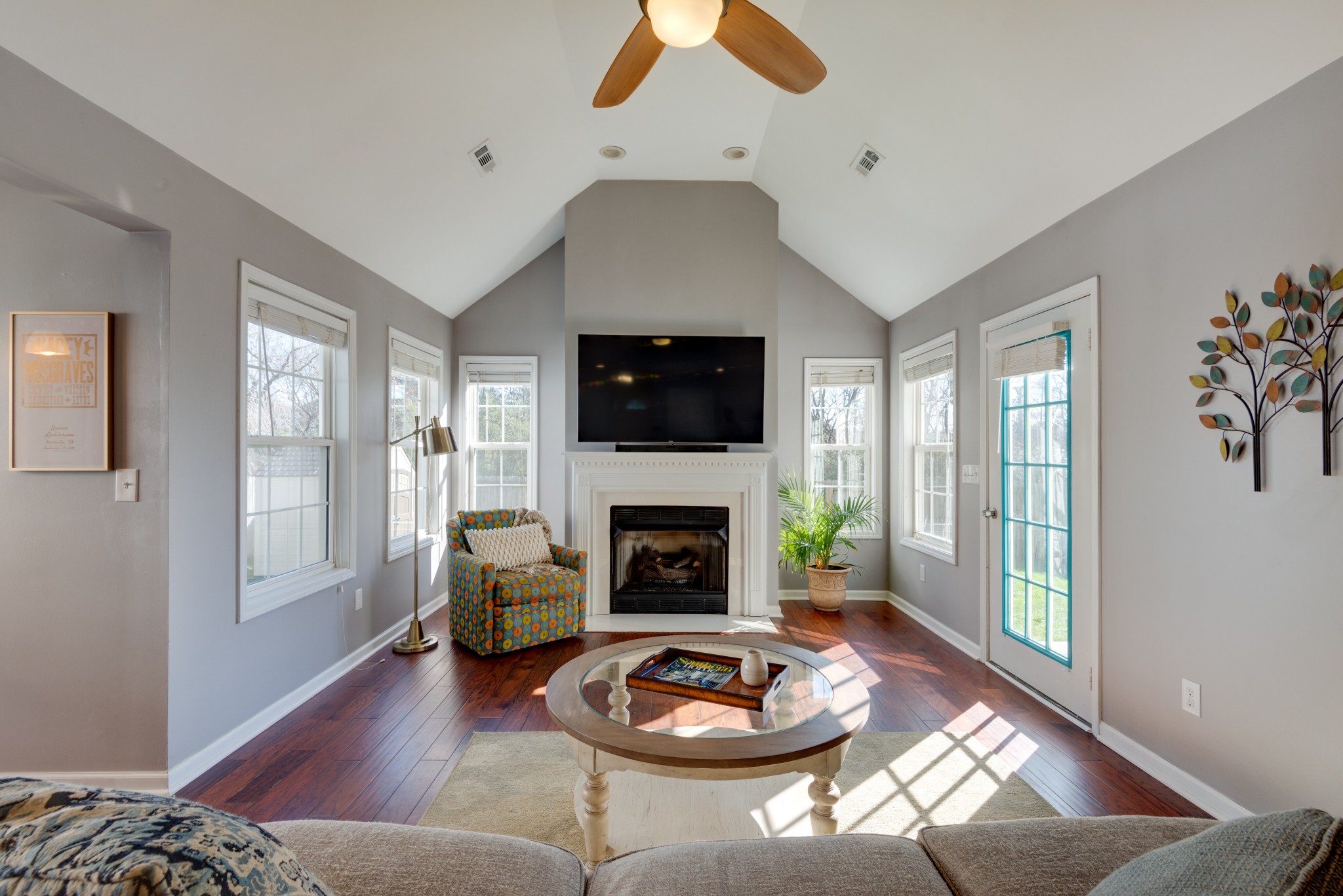303 Cheairs Court Spring Hill, TN 37174 - Photo 8 of 23 a living room with furniture and a fireplace