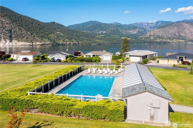 a view of a swimming pool with an ocean view