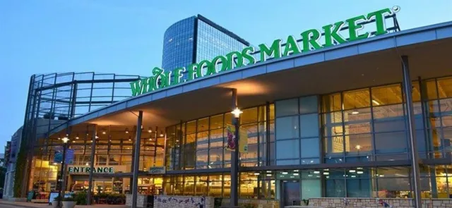 a view of a street with sign board