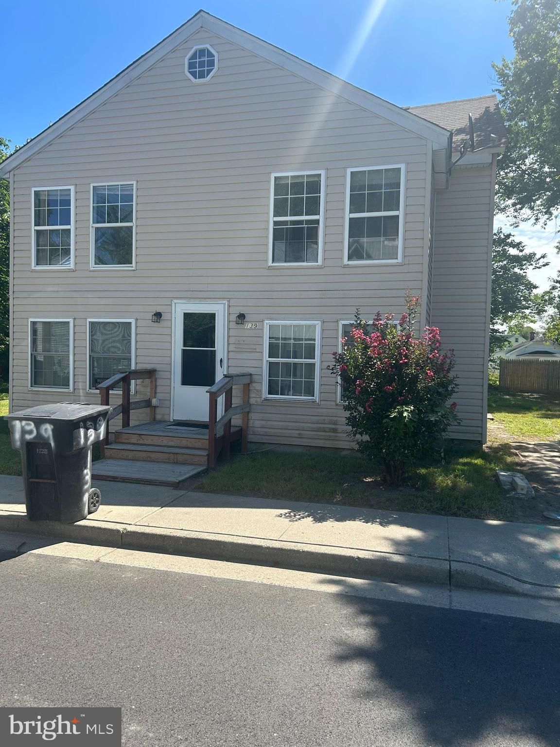 a view of house with outdoor space