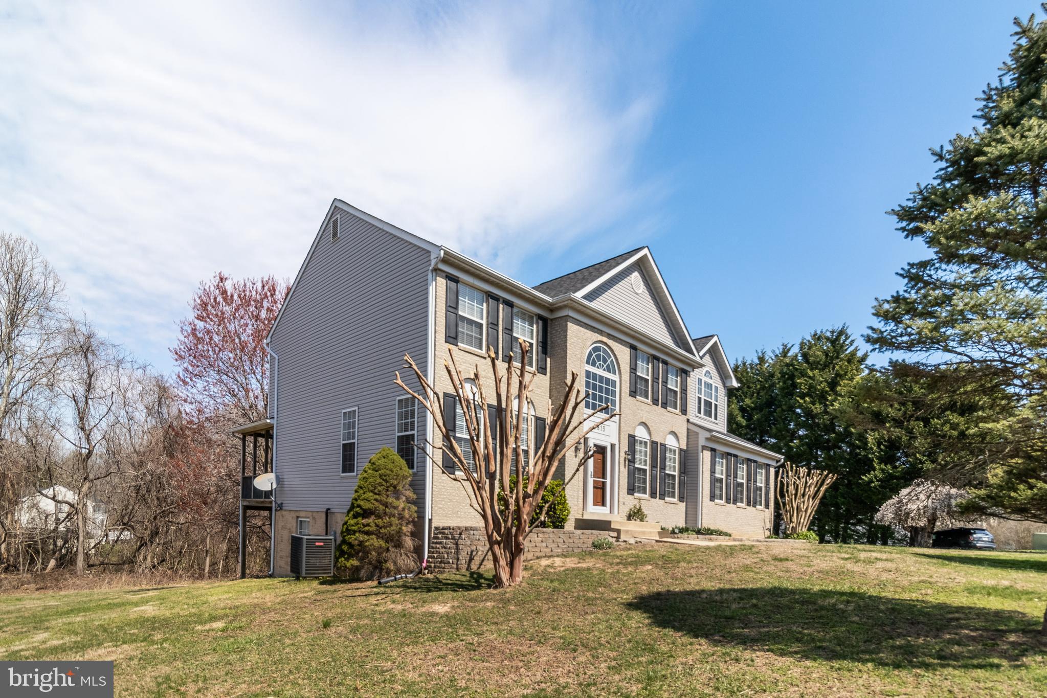 5815 Mill Branch Road Huntingtown, MD 20639 - Photo 2 of 47 a view of a house with a yard