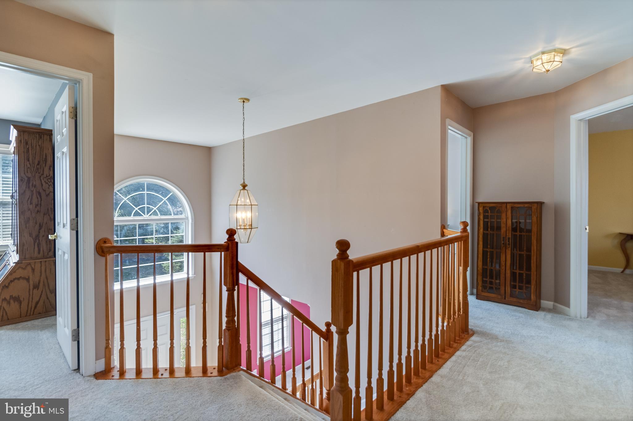 5815 Mill Branch Road Huntingtown, MD 20639 - Photo 24 of 47 a view of hallway with door with wooden floor