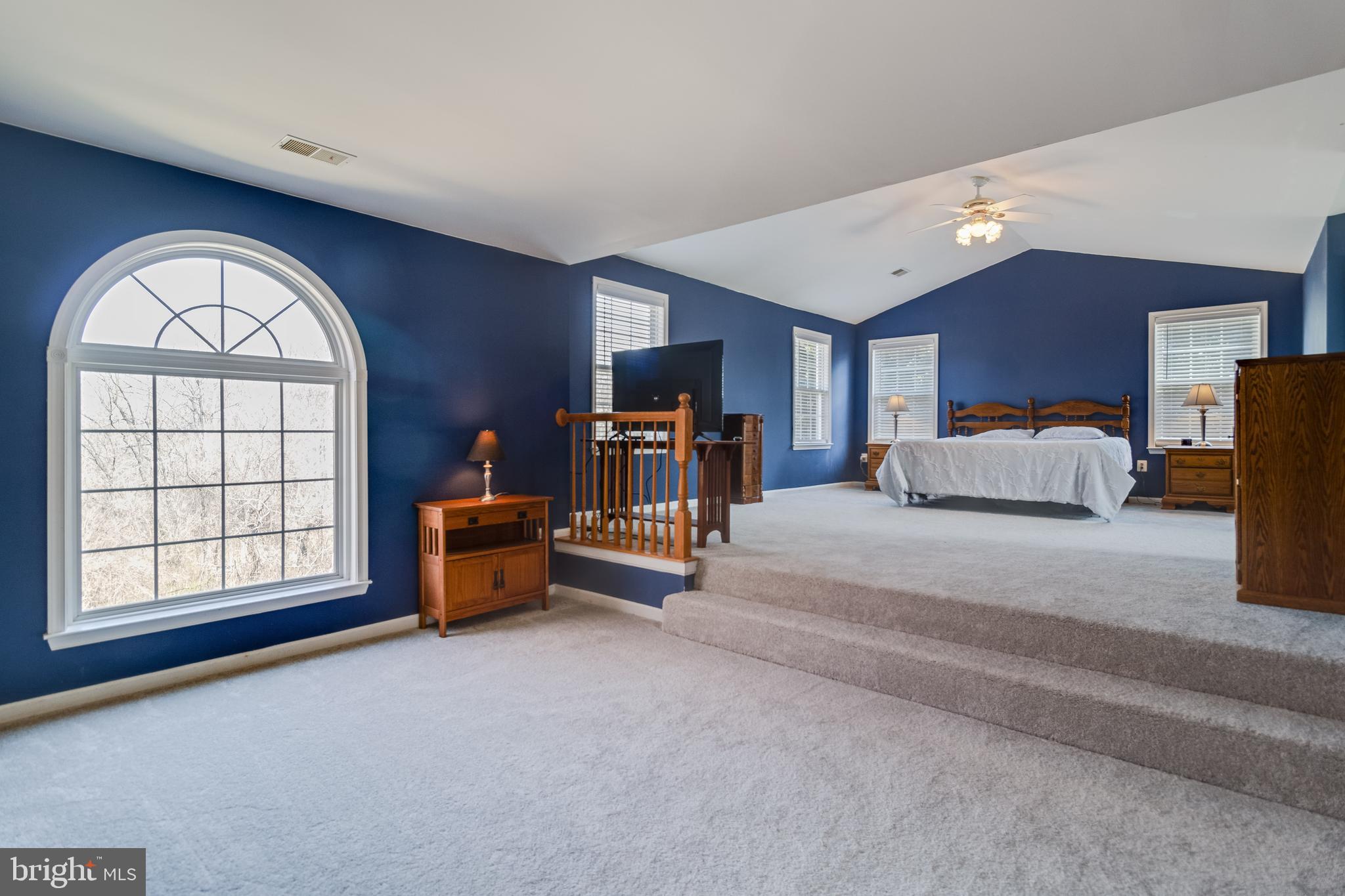 5815 Mill Branch Road Huntingtown, MD 20639 - Photo 27 of 47 a living room with furniture and a window