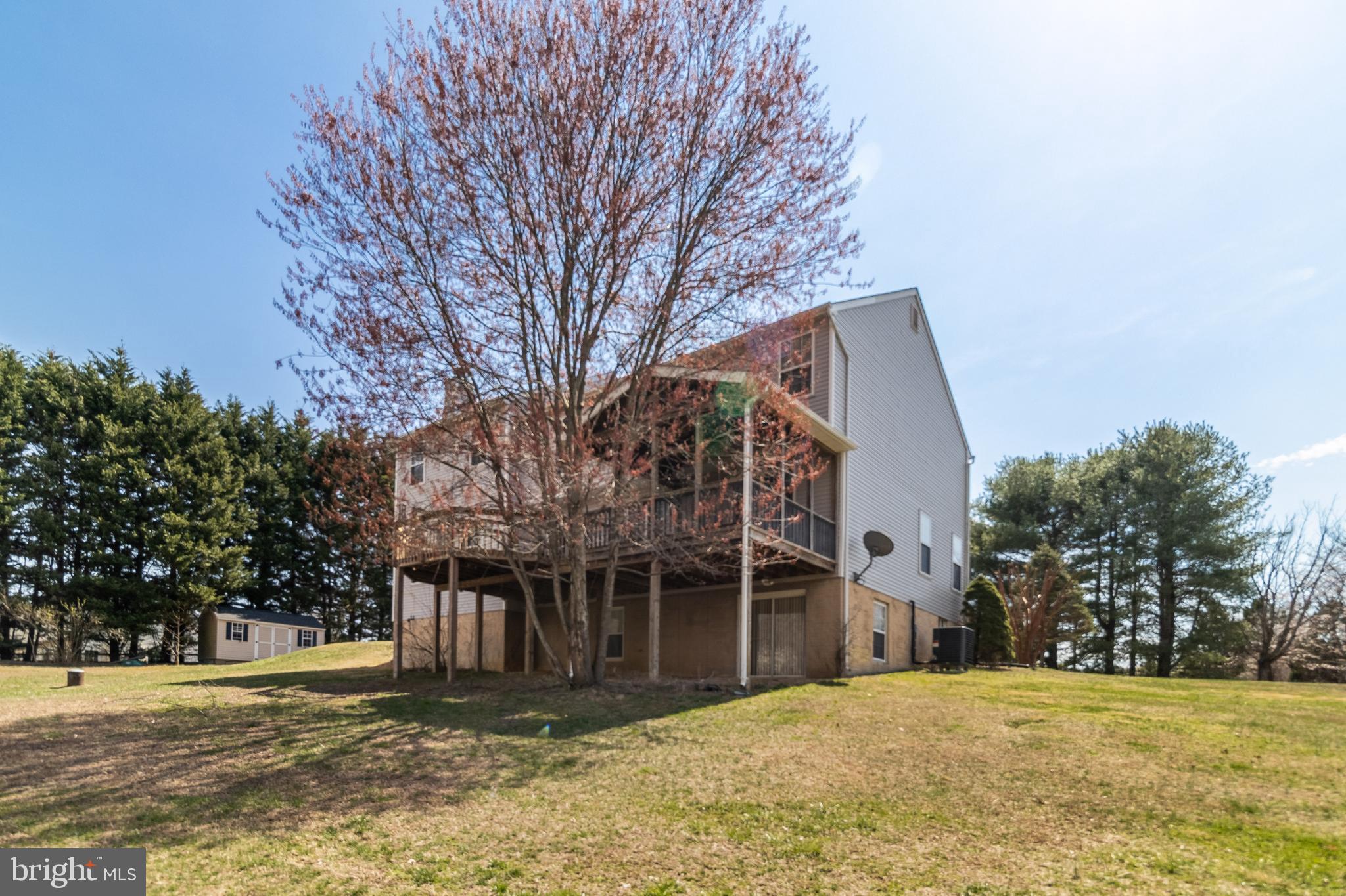 5815 Mill Branch Road Huntingtown, MD 20639 - Photo 42 of 47 a view of a house with a yard