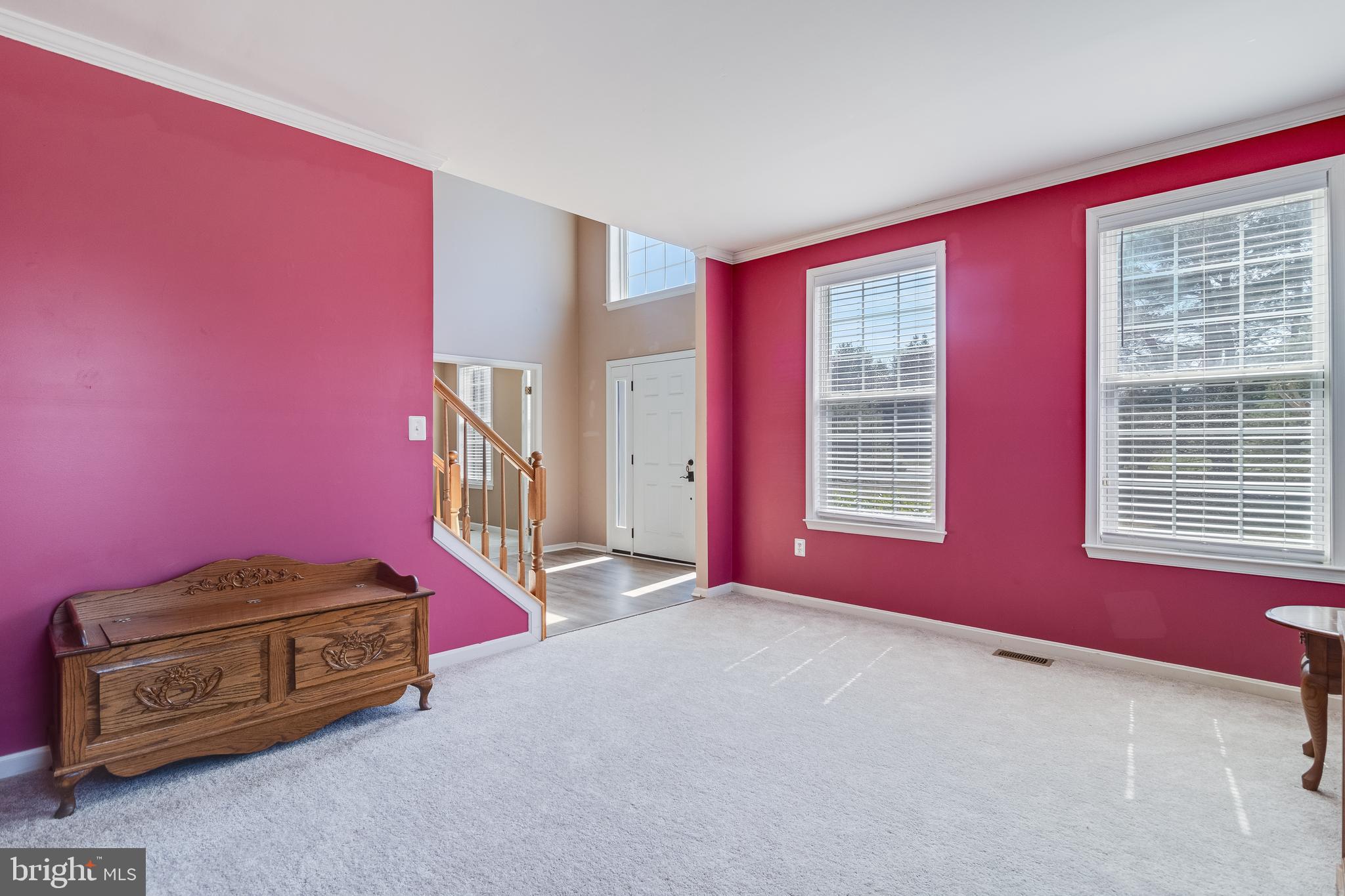 5815 Mill Branch Road Huntingtown, MD 20639 - Photo 9 of 47 a living room with furniture and a window