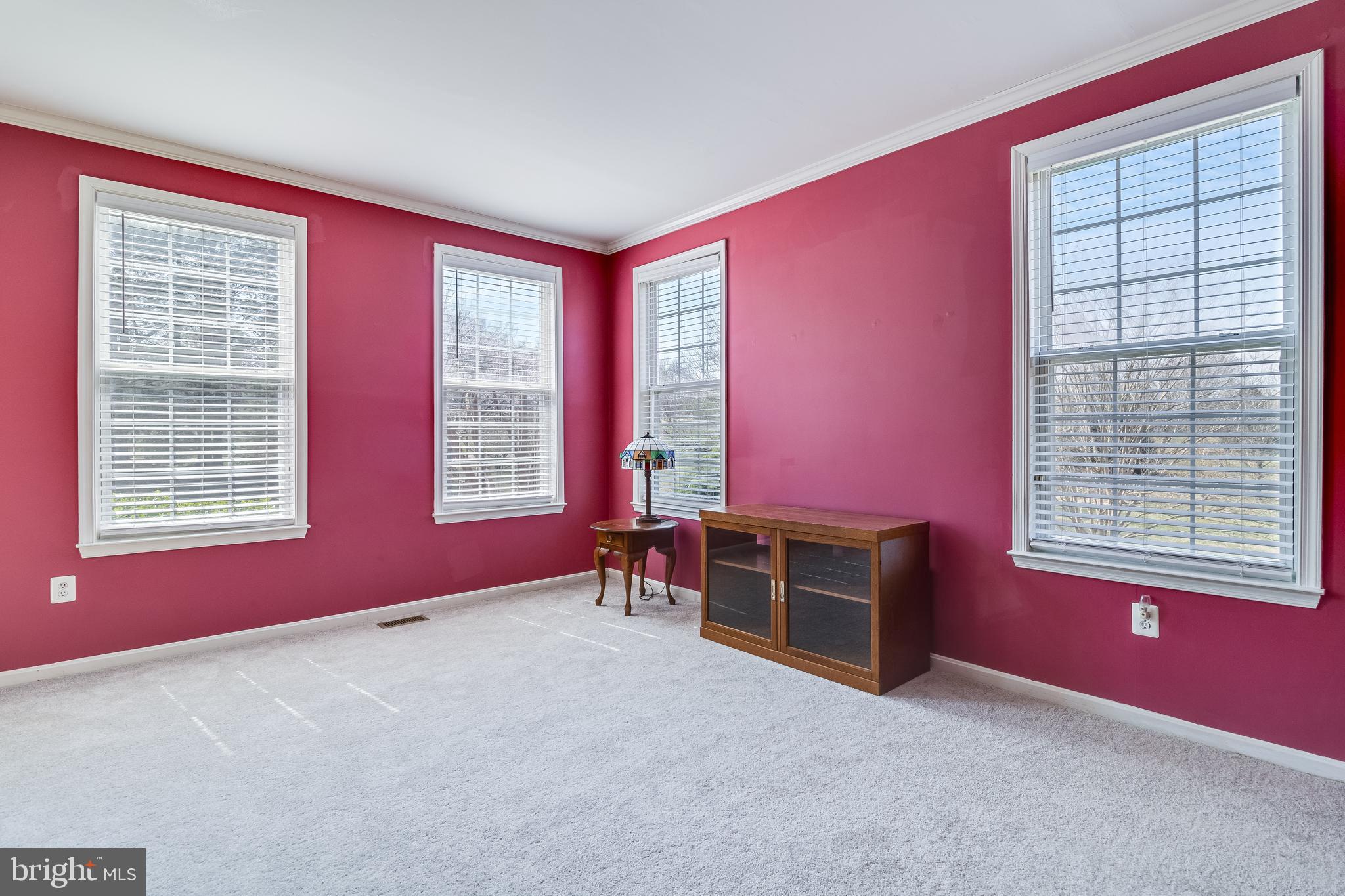 5815 Mill Branch Road Huntingtown, MD 20639 - Photo 10 of 47 a living room with windows