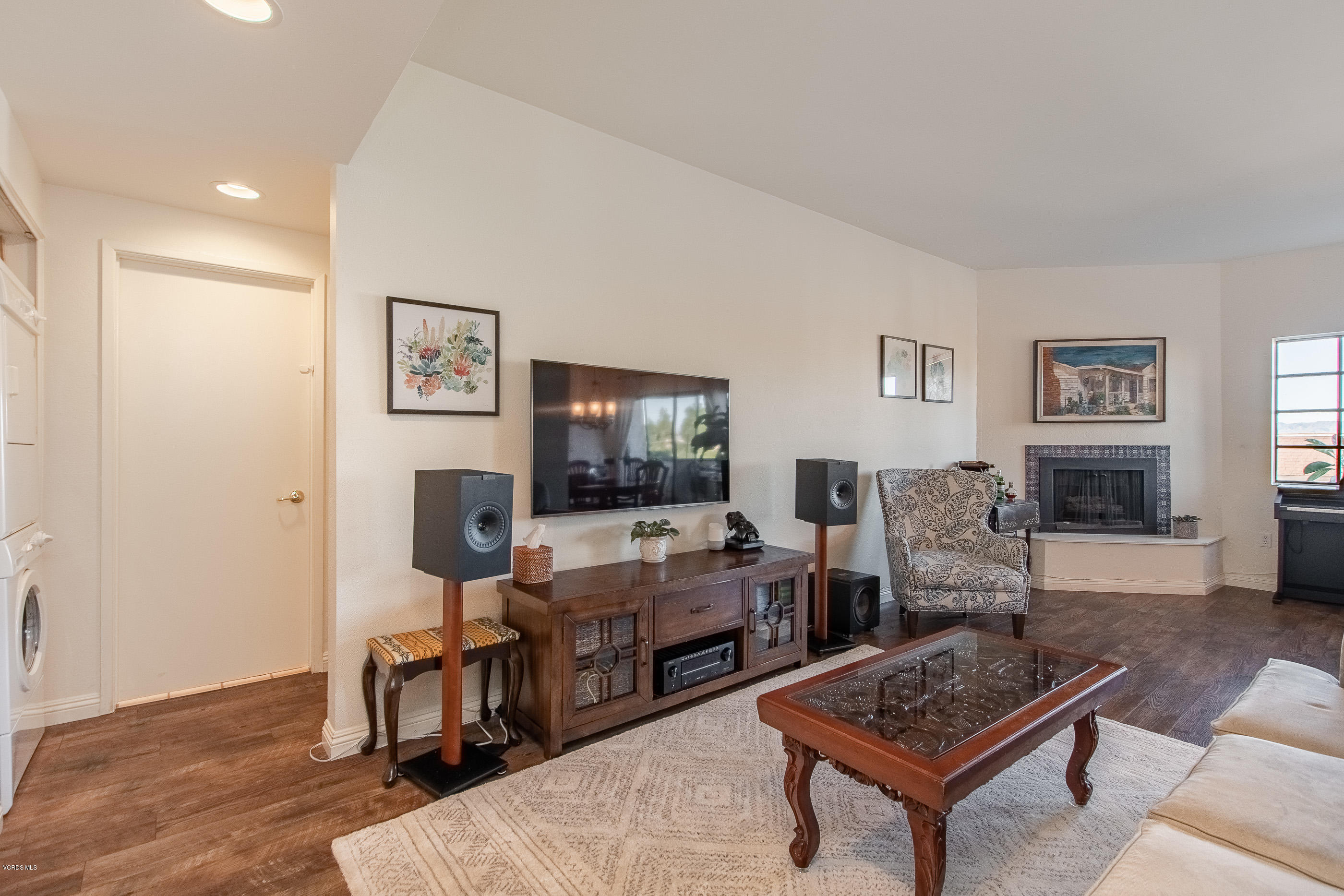 17914 West Magnolia Boulevard, Unit 316 Encino, CA 91316 - Photo 2 of 21 a living room with furniture and a flat screen tv