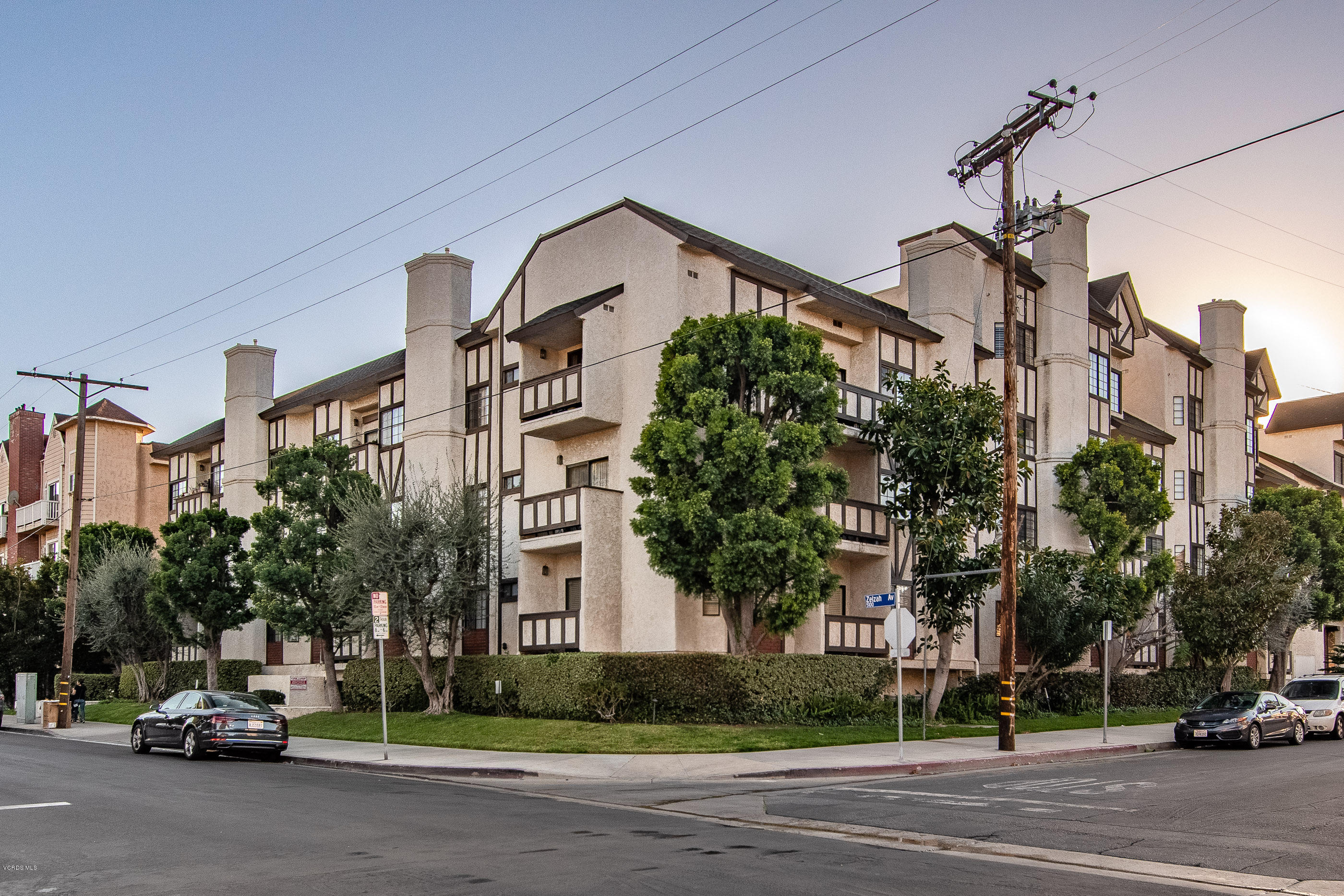 17914 West Magnolia Boulevard, Unit 316 Encino, CA 91316 - Photo 21 of 21 a car parked on the side of a street