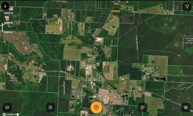 a bathroom with a shower and toilet