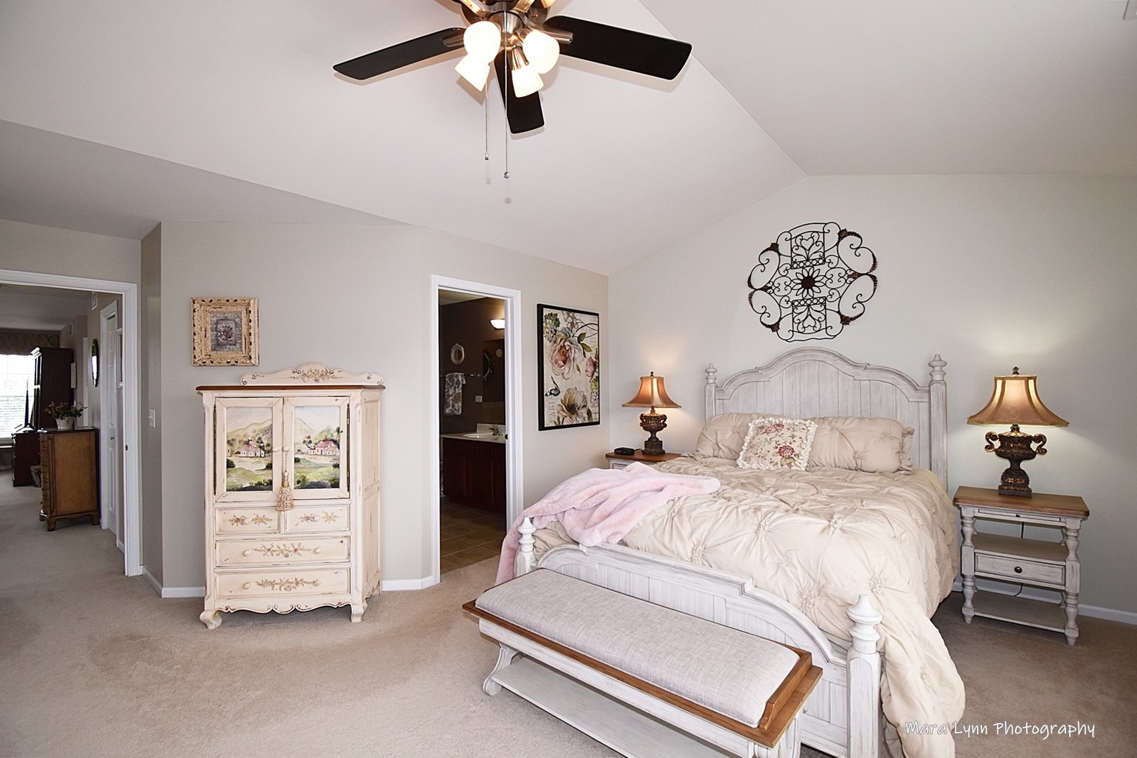 1986 West Cobblestone Road, Unit 1986 Romeoville, IL 60446 - Photo 23 of 36 a bedroom with a bed and a chandelier