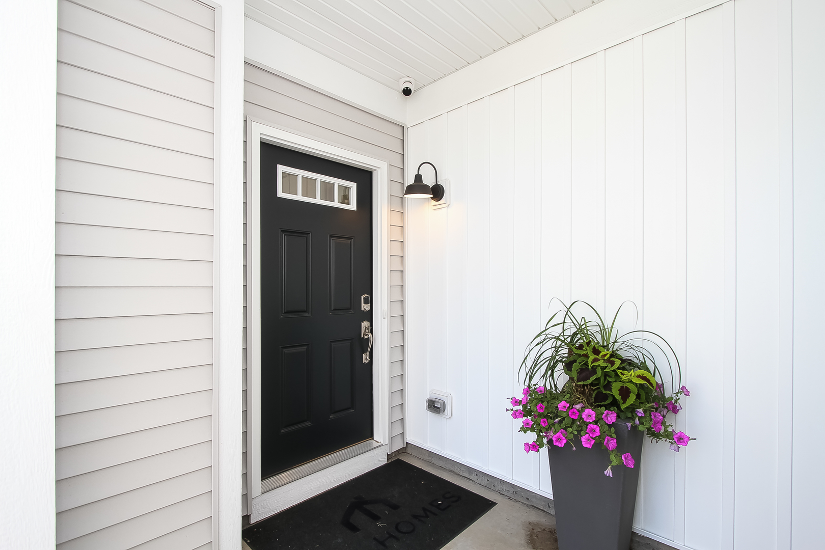 558 Comstock Road South Elgin, IL 60177 - Photo 2 of 26 a potted plant sitting in front of a door