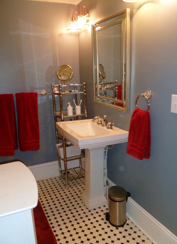 3388 Webster Road Blue Ridge, VA 24064 - Photo 18 of 40 a bathroom with a sink a toilet and mirror
