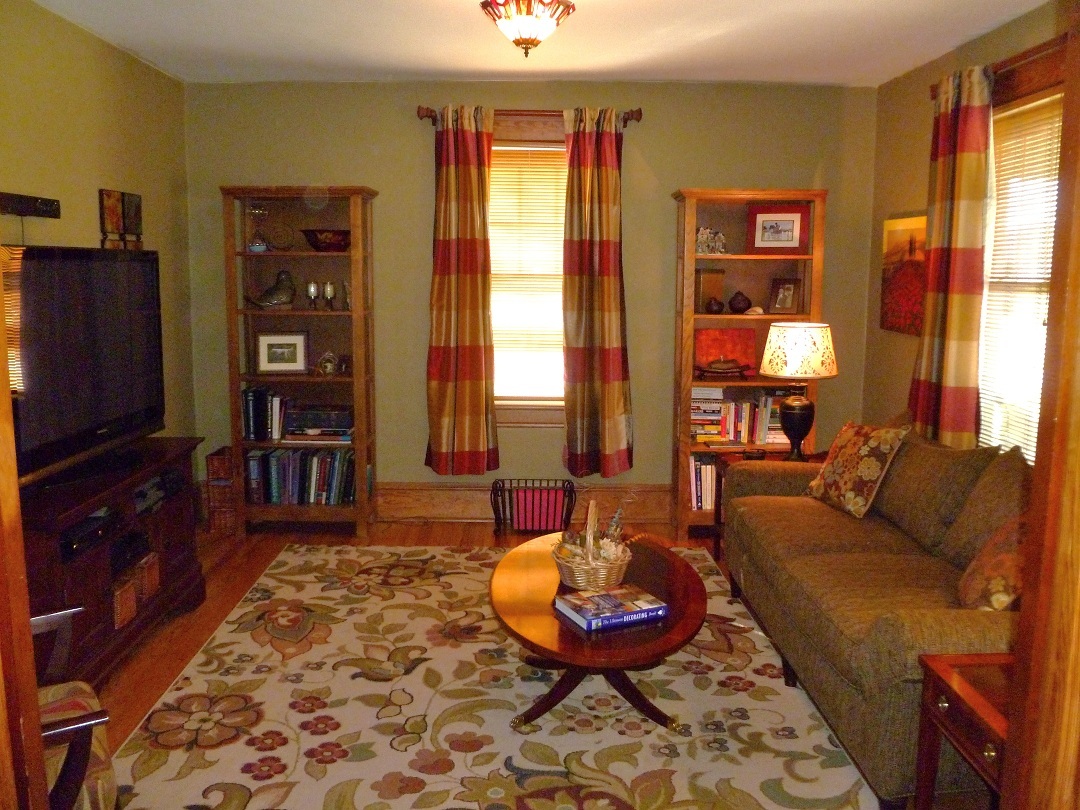 3388 Webster Road Blue Ridge, VA 24064 - Photo 9 of 40 a living room with furniture a rug and a flat screen tv