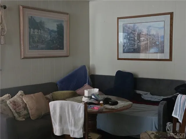 a white refrigerator freezer sitting inside of a kitchen