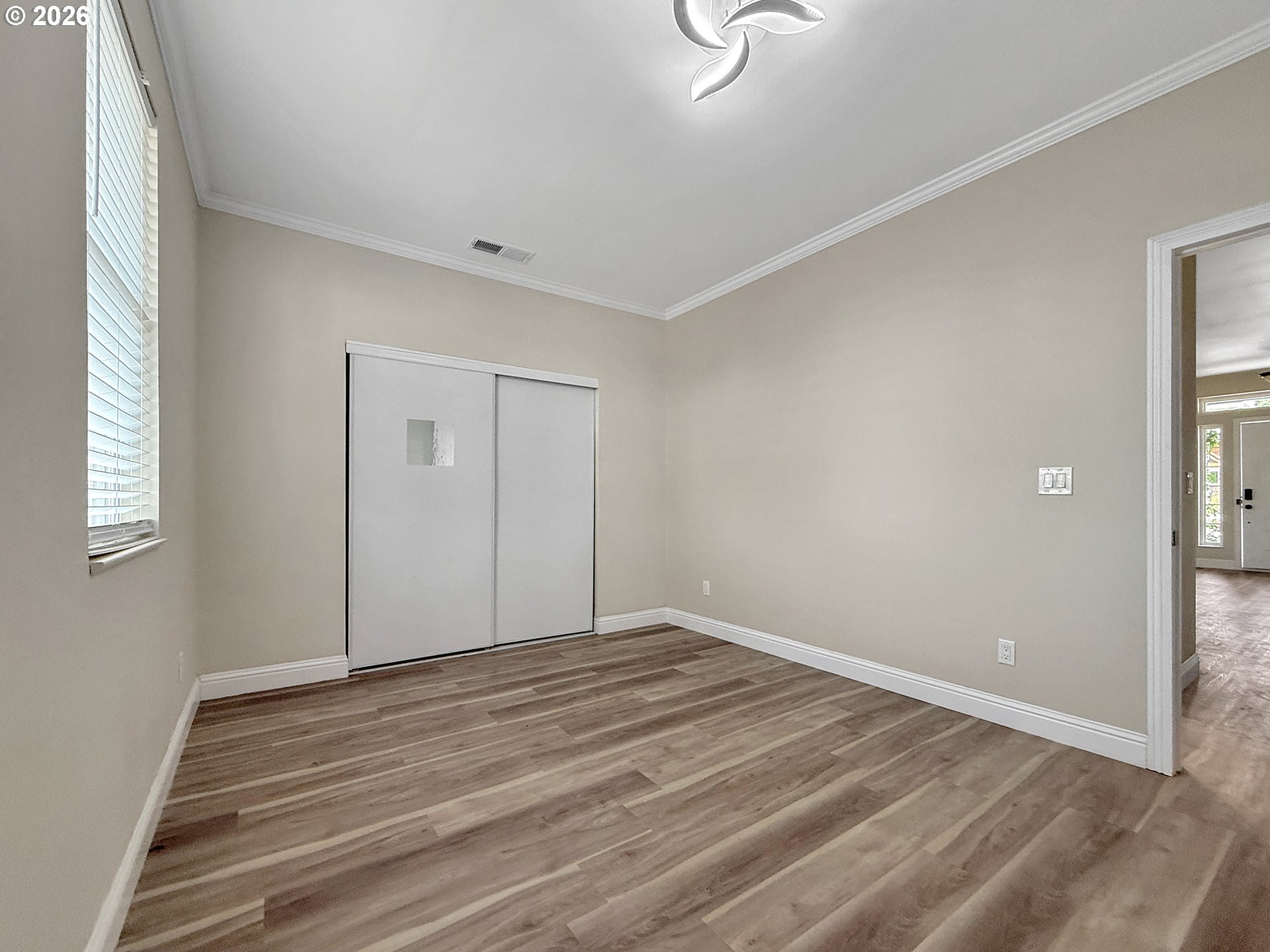 7175 Vista Ridge Drive Brookings, OR 97415 - Photo 19 of 43 a view of empty room with wooden floor