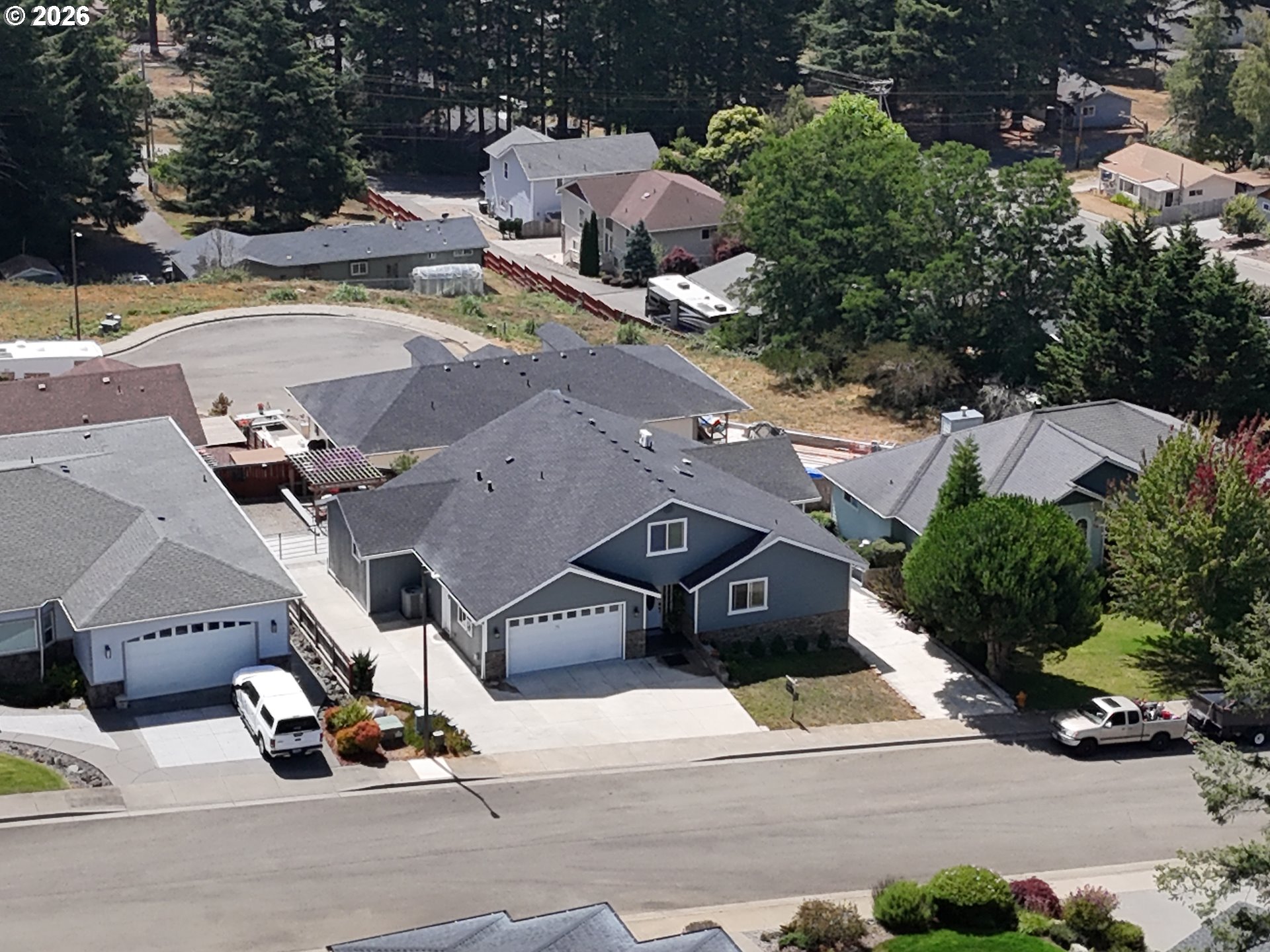 7175 Vista Ridge Drive Brookings, OR 97415 - Photo 2 of 43 an aerial view of a house with garden