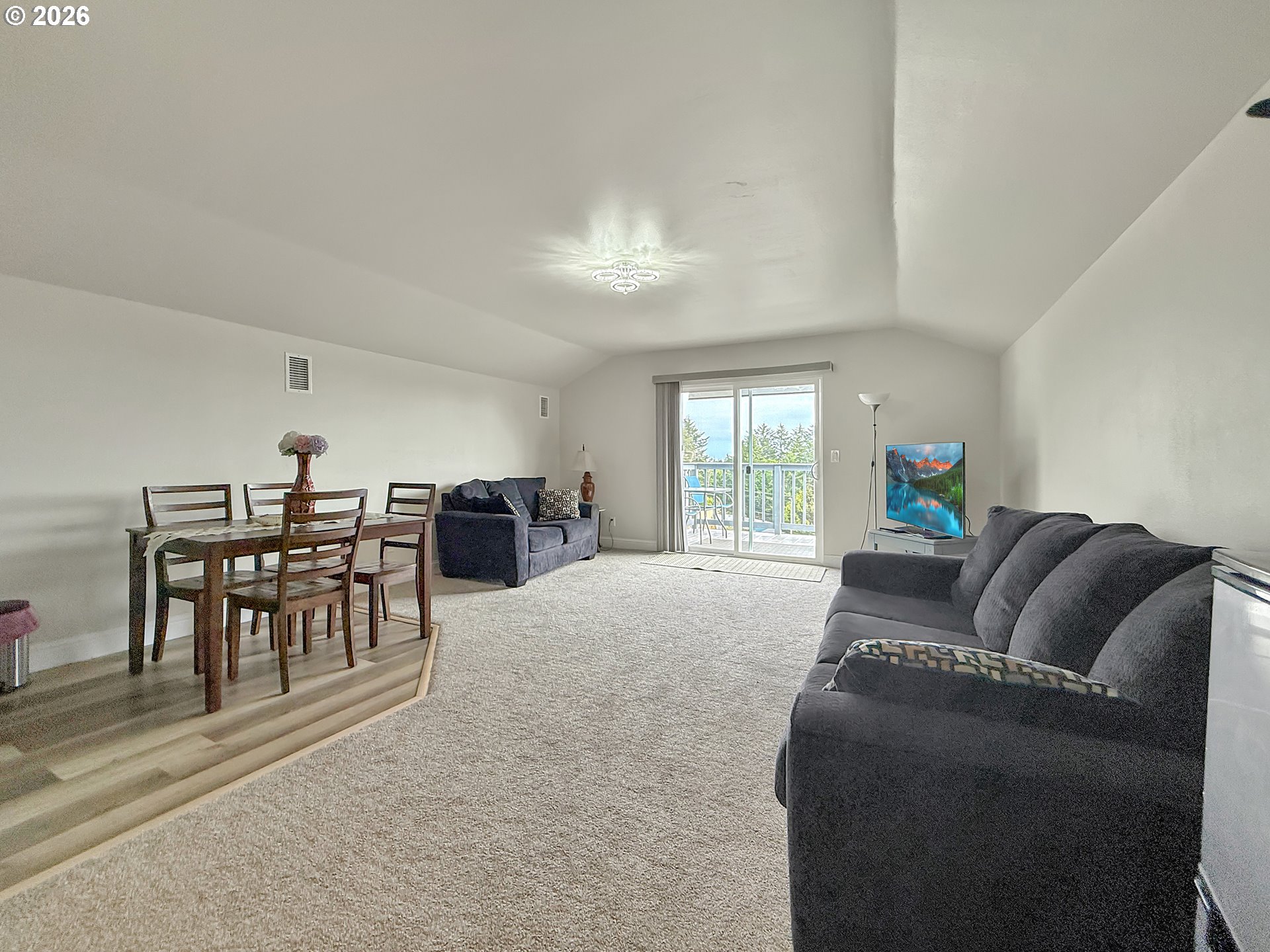 7175 Vista Ridge Drive Brookings, OR 97415 - Photo 25 of 43 a living room with furniture and a large window