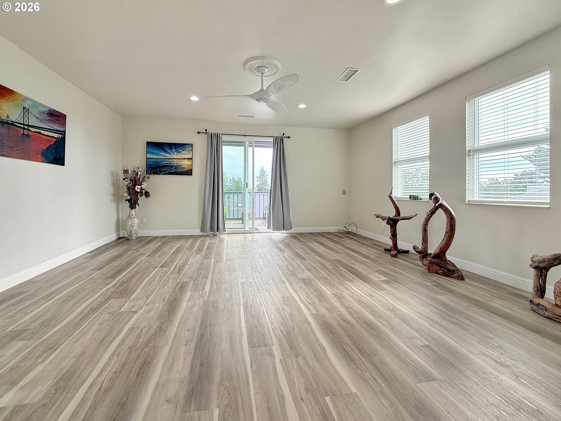 7175 Vista Ridge Drive Brookings, OR 97415 - Photo 5 of 43 a view of a room with wooden floor and window