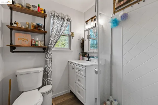 a bedroom with bed and window