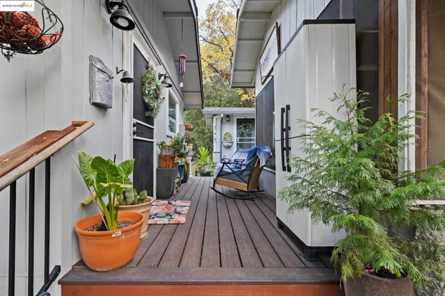 a view of outdoor seating space with wooden floor