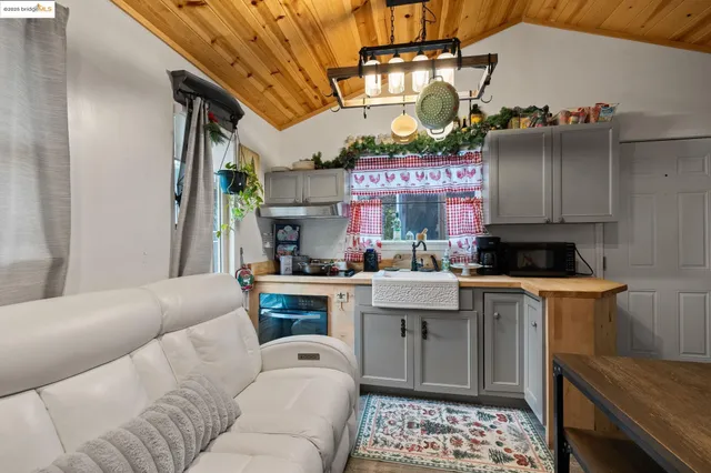 a outdoor living space with furniture and a potted plant