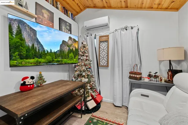 a kitchen with a refrigerator and a sink