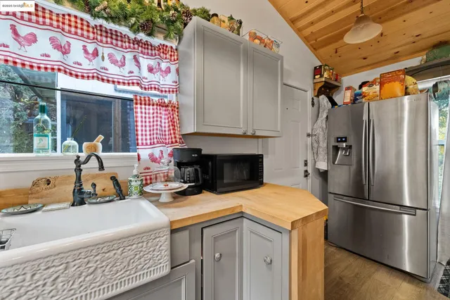 a bathroom with a toilet a sink and a mirror