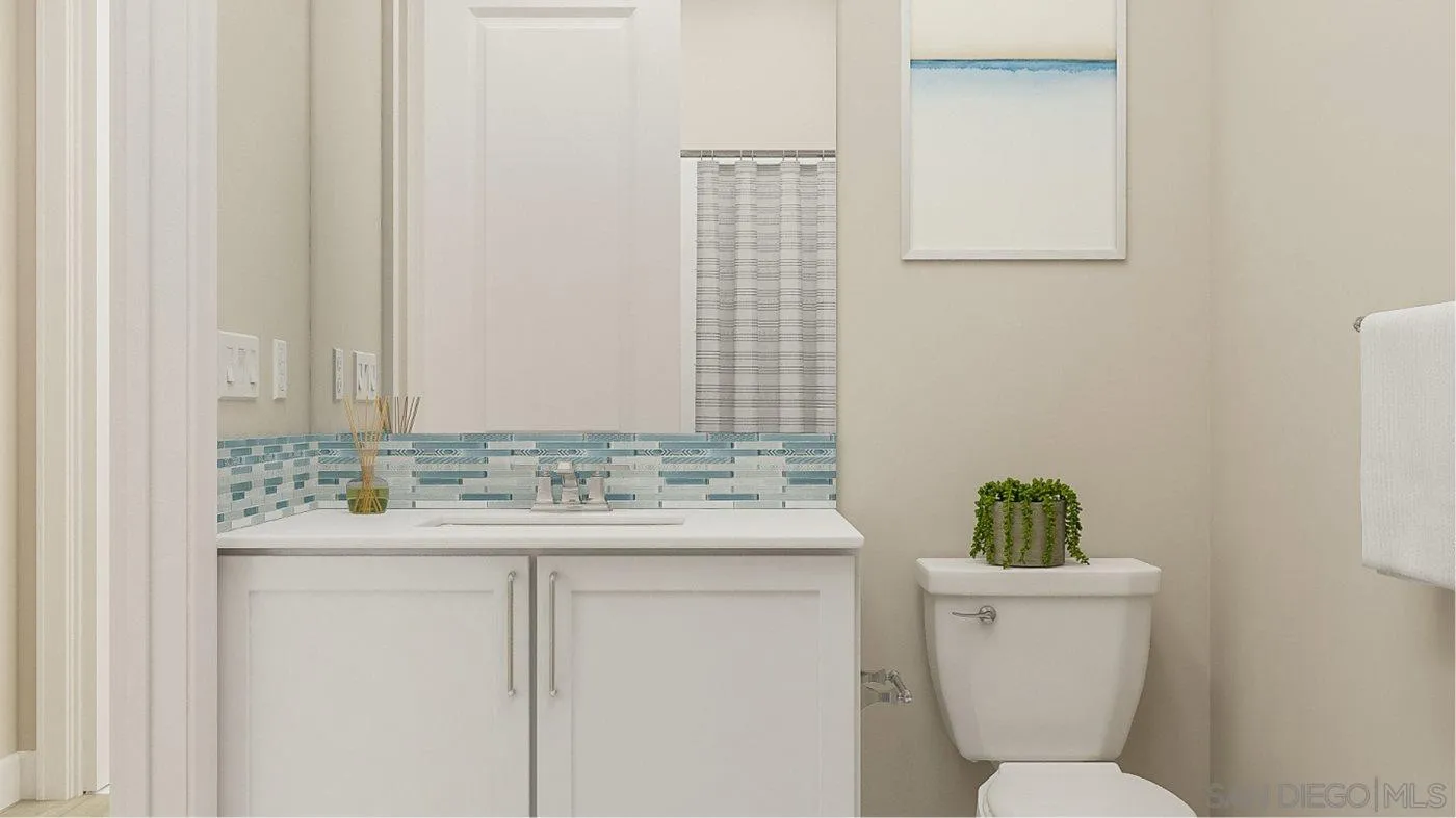 13357 Jimmy Way Poway, CA 92064 - Photo 13 of 19 a bathroom with a toilet sink and mirror
