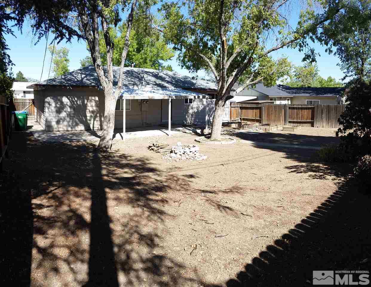 945 Beldon Way Reno, NV 89503 - Photo 14 of 20 a front view of a house with a yard