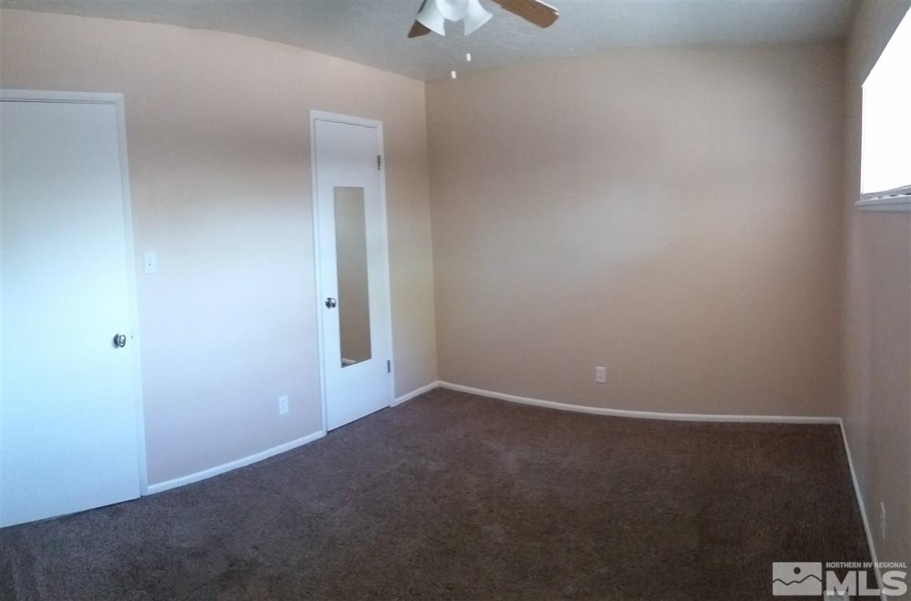 945 Beldon Way Reno, NV 89503 - Photo 9 of 20 an empty room with a bathroom