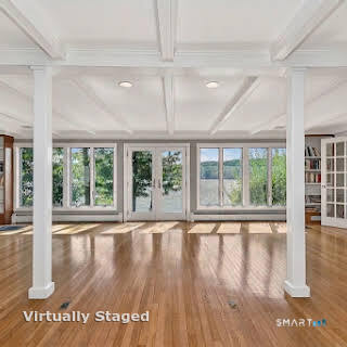 98 Island Trail Morris, CT 06763 - Photo 12 of 36 a view of an entryway with wooden floor