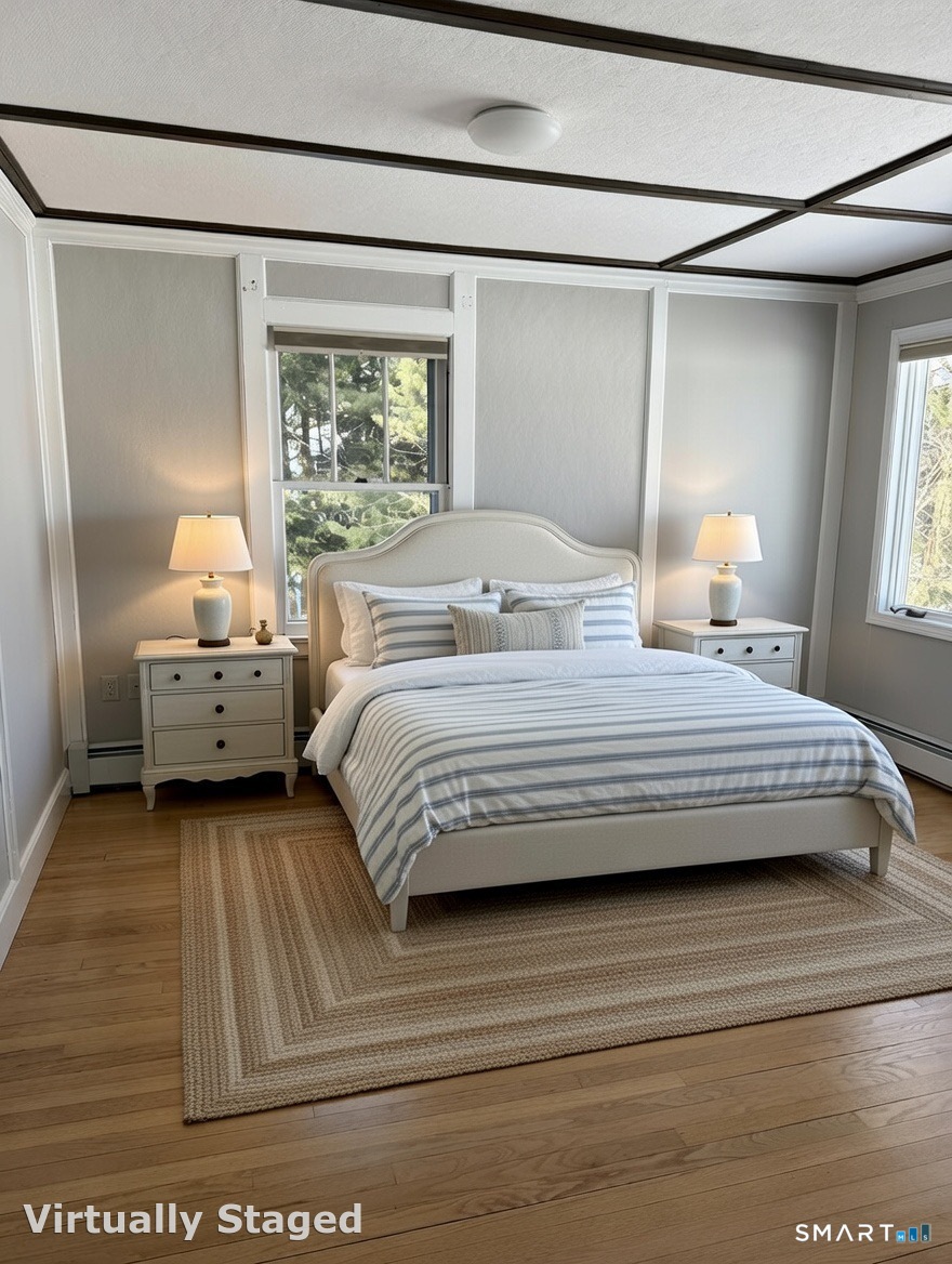 98 Island Trail Morris, CT 06763 - Photo 23 of 36 a bedroom with a bed and window
