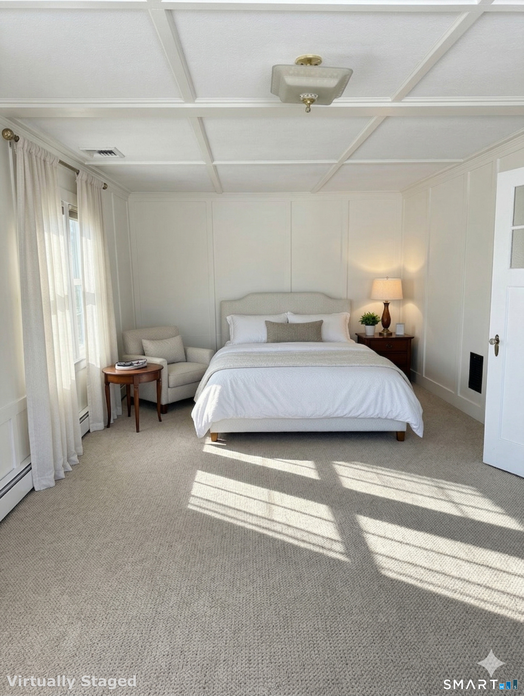 98 Island Trail Morris, CT 06763 - Photo 26 of 36 a bedroom with a bed and a chandelier