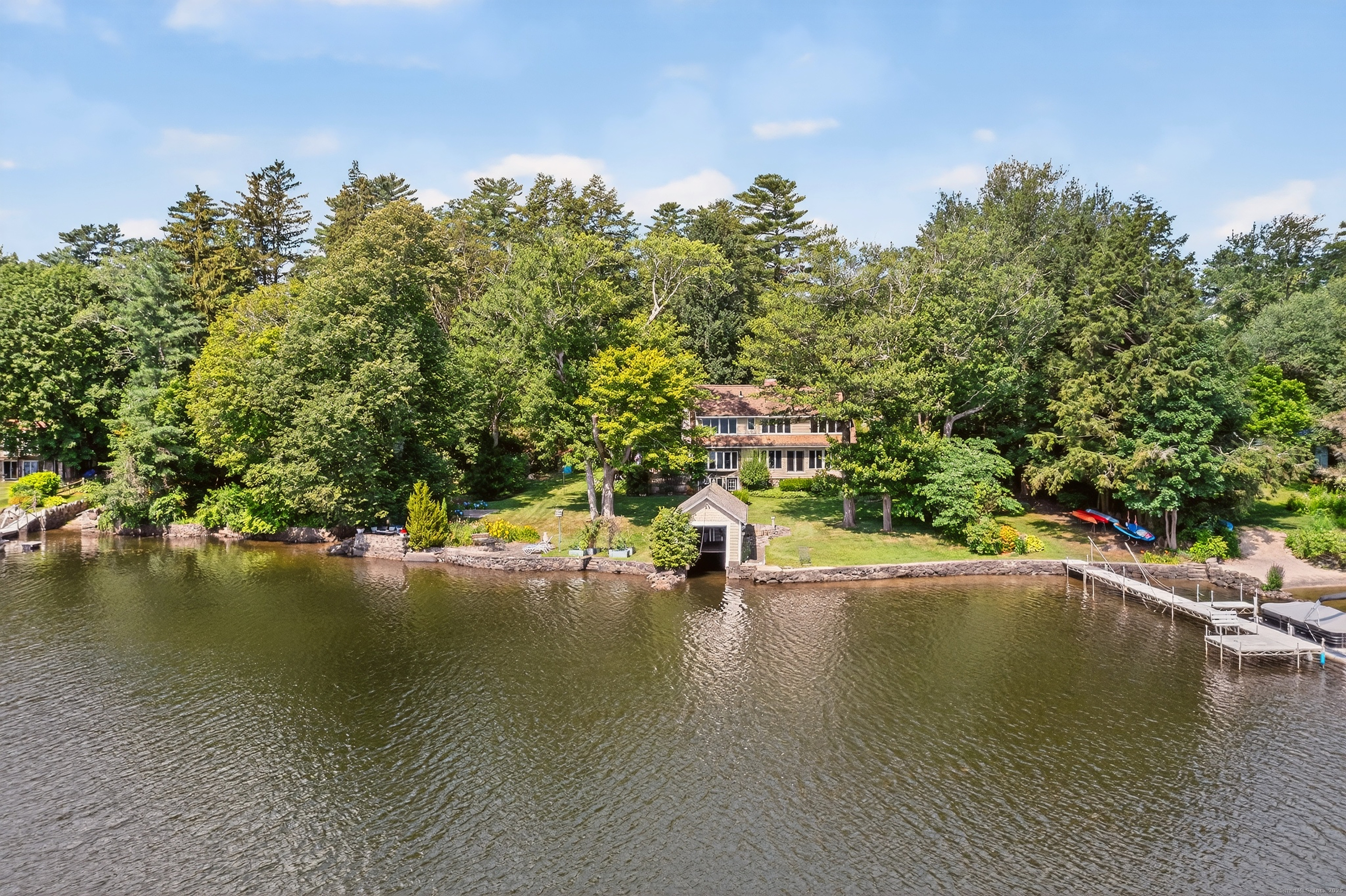 98 Island Trail Morris, CT 06763 - Photo 3 of 36 a view of a lake with houses