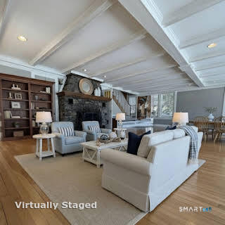 98 Island Trail Morris, CT 06763 - Photo 10 of 36 a living room with furniture and a fireplace